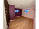 Bedroom with wood-look floors and painted walls at 1310 Fremont St, Pahrump, NV 89048