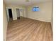 Spacious bedroom with mirrored closet and wood-look floors at 1310 Fremont St, Pahrump, NV 89048