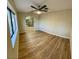 Dining area with wood-look floors and kitchen access at 1310 Fremont St, Pahrump, NV 89048