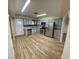 Modern kitchen with stainless steel appliances and gray cabinets at 1310 Fremont St, Pahrump, NV 89048