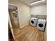 Laundry room with washer, dryer, and cabinets at 1310 Fremont St, Pahrump, NV 89048