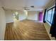 Bright and airy living room featuring wood-look floors at 1310 Fremont St, Pahrump, NV 89048