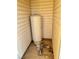 Exterior utility closet with water pump and storage at 1310 Fremont St, Pahrump, NV 89048