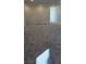 Upstairs loft featuring neutral gray carpet and white banister overlooking the stairs at 7086 Parkallen Ave, Las Vegas, NV 89113