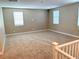 Spacious loft area with carpeted flooring and natural light at 7160 Port Stephens St, North Las Vegas, NV 89084