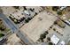 Aerial view of vacant lot ready for construction, near other homes at 1680 Landmark Ave, Pahrump, NV 89060