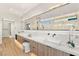 Modern bathroom with double vanity and marble countertops at 4377 Cameron Brook Ct, Las Vegas, NV 89129