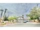 Two-story house with a three-car garage and landscaping at 9917 Aspen Knoll Ct, Las Vegas, NV 89117