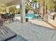 Covered patio with outdoor dining and grilling area at 9917 Aspen Knoll Ct, Las Vegas, NV 89117