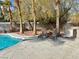 Poolside lounge chairs and patio area at 9917 Aspen Knoll Ct, Las Vegas, NV 89117