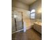 Bathroom with shower, bathtub and double vanity at 9804 Panorama Cliff Dr, Las Vegas, NV 89134