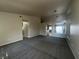 Bright living room featuring tile flooring and an open floor plan at 9804 Panorama Cliff Dr, Las Vegas, NV 89134