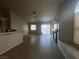 Living room with tile floors, fireplace, and access to backyard at 9804 Panorama Cliff Dr, Las Vegas, NV 89134