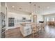 Spacious kitchen with island, stainless steel appliances, and granite countertops at 4775 E Beacon Ridge Dr, Pahrump, NV 89061