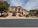 Charming two-story home with a red tile roof, multiple-car garage, and well-manicured front yard at 2742 Kingclaven Dr, Henderson, NV 89044
