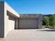 Spacious three-car garage with modern design, offering ample parking and curb appeal at 6 Rockmount Ct, Henderson, NV 89012