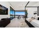 Bright main bedroom with a decorative rug and amazing views from its large sliding glass doors to the outside at 6 Rockmount Ct, Henderson, NV 89012