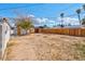 Large backyard with shed and wooden fence at 4313 El Conlon Ave, Las Vegas, NV 89102