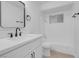 Modern bathroom with white vanity, bathtub, and mirror at 4313 El Conlon Ave, Las Vegas, NV 89102