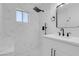 Modern bathroom with marble shower and new vanity at 4313 El Conlon Ave, Las Vegas, NV 89102