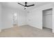 Bedroom with private bathroom access and ceiling fan at 4313 El Conlon Ave, Las Vegas, NV 89102