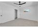 Spacious bedroom featuring a ceiling fan and closet at 4313 El Conlon Ave, Las Vegas, NV 89102