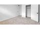 Simple bedroom featuring carpet, closet, and window at 4313 El Conlon Ave, Las Vegas, NV 89102