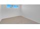 Spacious bedroom with a window and carpet at 4313 El Conlon Ave, Las Vegas, NV 89102