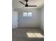 Bright bedroom with ceiling fan and carpet at 4313 El Conlon Ave, Las Vegas, NV 89102