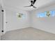 Bright bedroom with ceiling fan and neutral carpeting at 4313 El Conlon Ave, Las Vegas, NV 89102