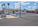 Single story home with a long driveway and palm trees at 4313 El Conlon Ave, Las Vegas, NV 89102
