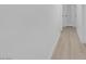 Clean hallway with light walls and new flooring at 4313 El Conlon Ave, Las Vegas, NV 89102