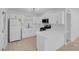 Renovated kitchen, boasting white cabinets and an island at 4313 El Conlon Ave, Las Vegas, NV 89102