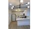 Modern kitchen with white cabinets and island at 4313 El Conlon Ave, Las Vegas, NV 89102
