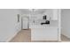 Bright white kitchen featuring new cabinets and flooring at 4313 El Conlon Ave, Las Vegas, NV 89102