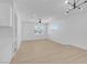 Open living space with kitchen island and light flooring at 4313 El Conlon Ave, Las Vegas, NV 89102
