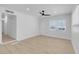 Spacious living area with light walls, wood-look floors and recessed lighting at 4313 El Conlon Ave, Las Vegas, NV 89102