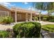 Lush backyard with manicured landscaping and an inviting covered patio area at 1629 Black Fox Canyon Rd, Henderson, NV 89052
