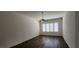 Bedroom with hardwood flooring, a ceiling fan and plantation shutters for natural light control at 1629 Black Fox Canyon Rd, Henderson, NV 89052