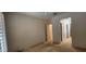 Bright bedroom featuring a ceiling fan, closet, and carpet flooring at 1629 Black Fox Canyon Rd, Henderson, NV 89052