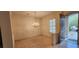 Dining room with tile flooring, chandelier and lots of natural light at 1629 Black Fox Canyon Rd, Henderson, NV 89052