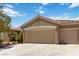 Charming single-story home featuring a spacious three-car garage and meticulously maintained landscaping at 1629 Black Fox Canyon Rd, Henderson, NV 89052