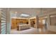 Bright, open floorplan with a large kitchen island, oak cabinets, and tile floors at 1629 Black Fox Canyon Rd, Henderson, NV 89052