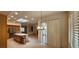 Spacious kitchen flows into dining and living area with tiled floors and oak cabinets at 1629 Black Fox Canyon Rd, Henderson, NV 89052