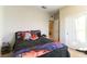Comfortable bedroom with a cozy bed and soft lighting at 3716 W Colton Ave, North Las Vegas, NV 89032