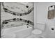 Stylish bathroom with a marble shower, modern fixtures, and a clean, minimalist design at 9760 Solar Ave, Las Vegas, NV 89149