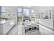 Modern bathroom featuring a soaking tub with marble surround and dual vanities at 9760 Solar Ave, Las Vegas, NV 89149