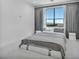 Bright bedroom with scenic views, neutral carpeting, and modern decor at 9760 Solar Ave, Las Vegas, NV 89149