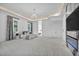 Spacious primary bedroom with a chandelier, recessed lighting, and plush carpeting at 9760 Solar Ave, Las Vegas, NV 89149