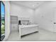 Bright, white office with a built-in desk, cabinets, and sleek, modern design at 9760 Solar Ave, Las Vegas, NV 89149